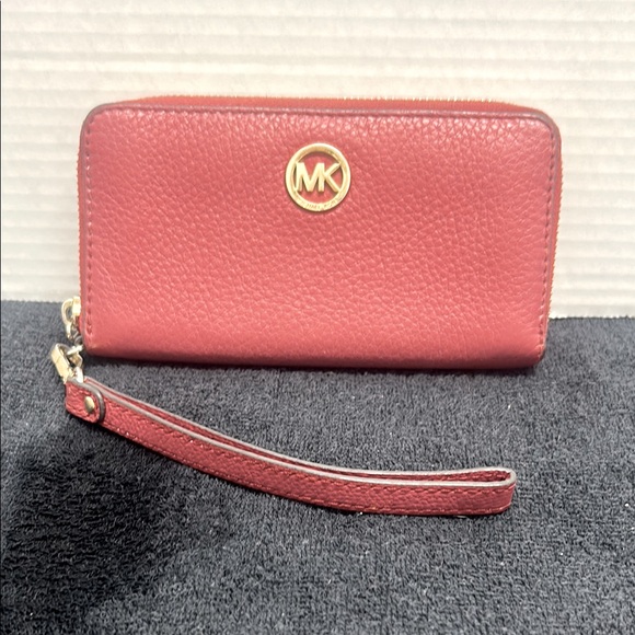Michael Kors Handbags - Michael Kors Red Pebbled Leather wallet